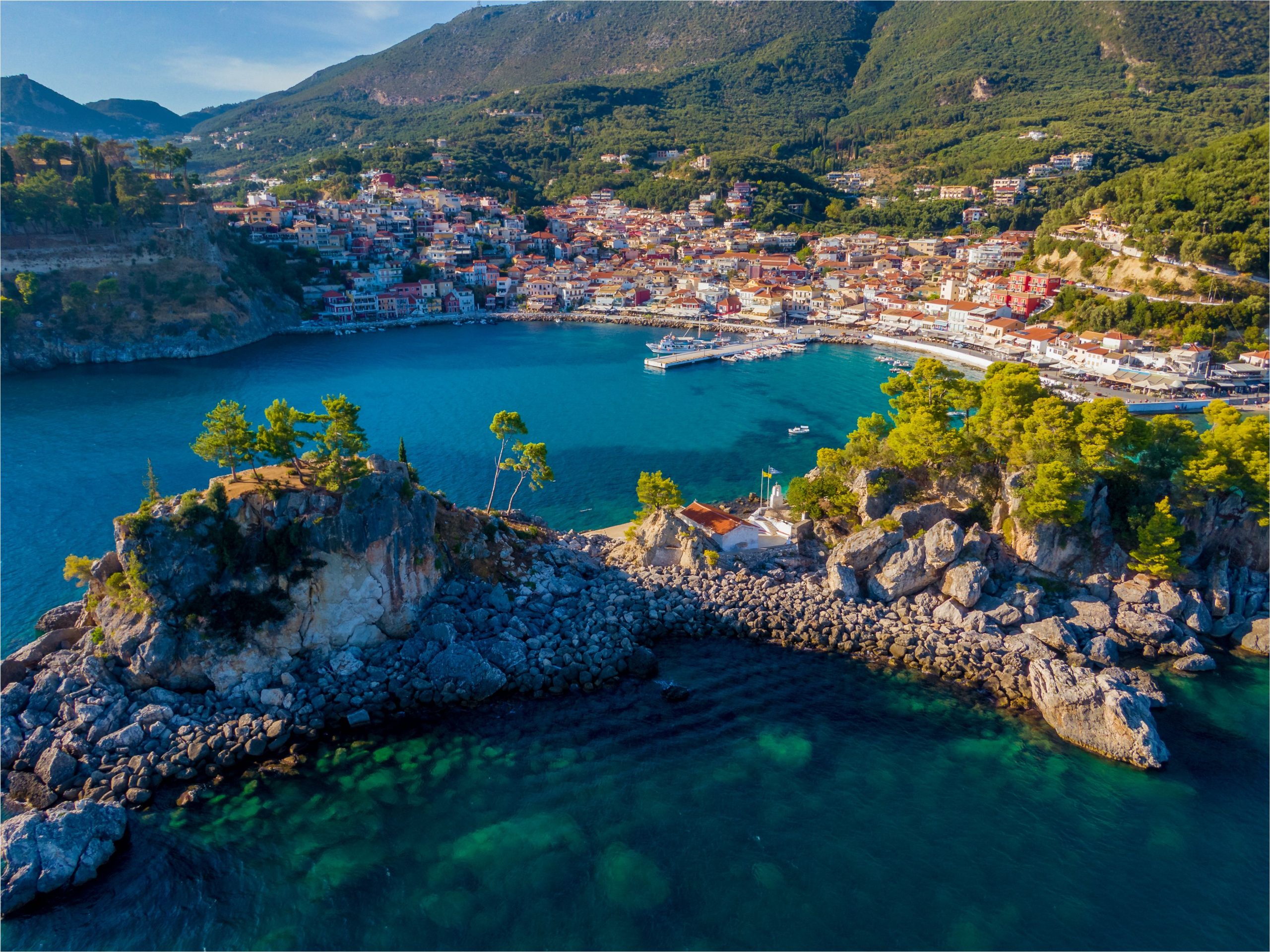 Parga's colorful waterfront with the Panagia islet in the foreground